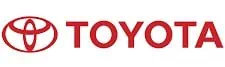 Red Toyota logo featuring an oval shape with intersecting lines on the left and the word "TOYOTA" in capital letters on the right. The design is on a white background.
